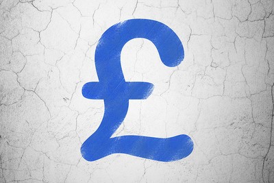 Blue Pound Sign on Cracked Wall