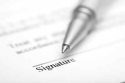 Blurred Silver Pen on Contract