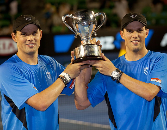 Bob Bryan and Mike Bryan with Australian Open Trophy