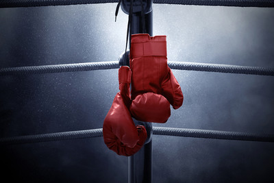 Boxing Gloves Hanging on Post