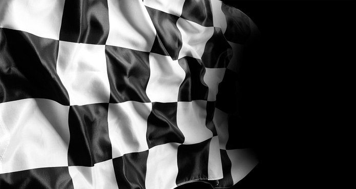 Chequered Flag Fading Into Dark Background