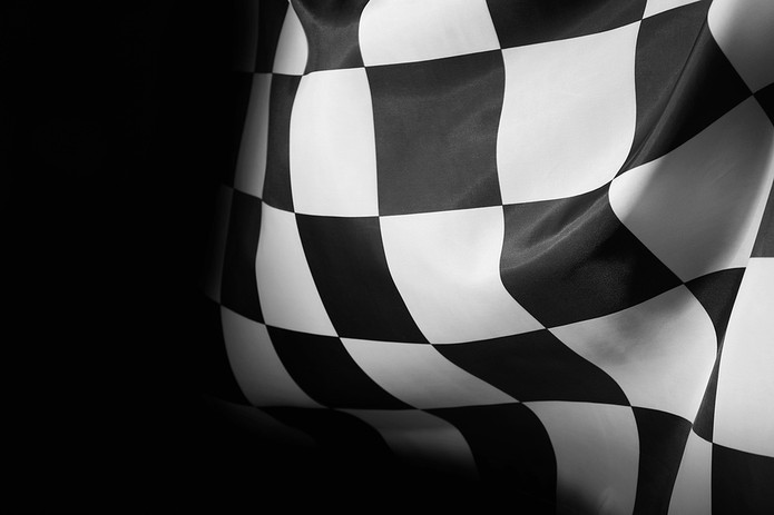 Chequered Flag Against Black Background