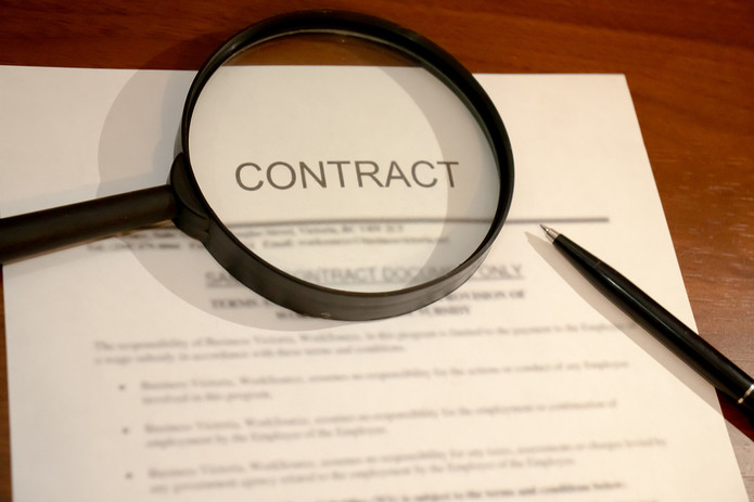 Contract and Magnifying Glass