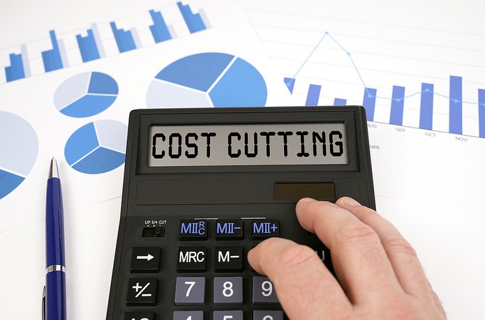 Cost Cutting Typed on Calculator