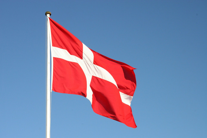 Danish Flag Against Blue Sky