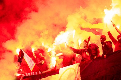 Football Hooligans with Flares at Game