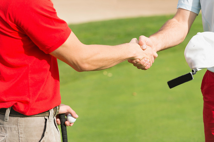Golfers Shaking Hands