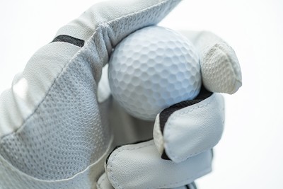Hand of Golfer Holding Ball