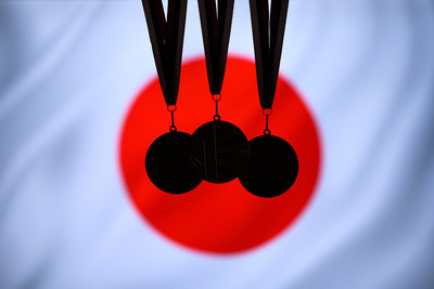 Japan Flag with Medal Silhouettes
