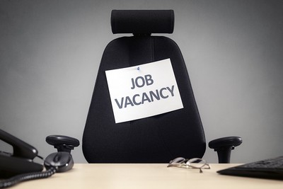 Job Vacancy Pinned on Office Chair