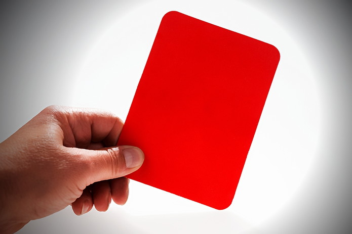 Man Holding Red Card
