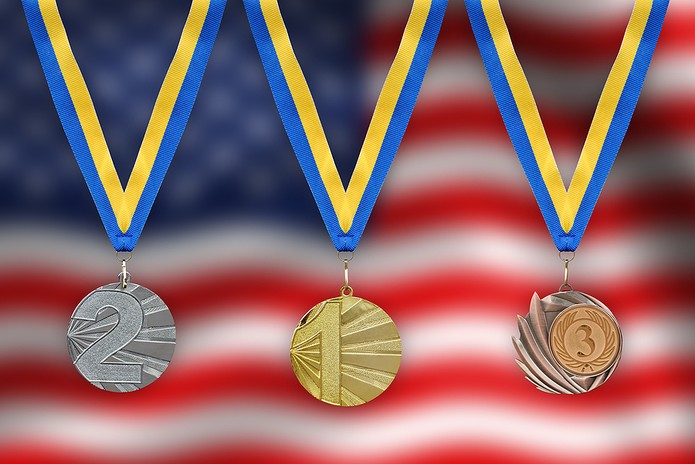 Medals Against Blurred USA Flag