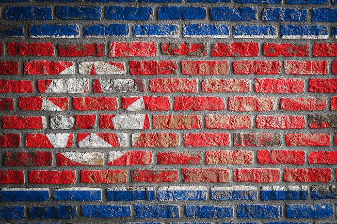 North Korean Flag Painted on Brick Wall