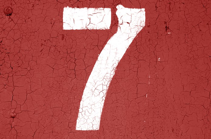 Number 7 on Red Cracked Wall