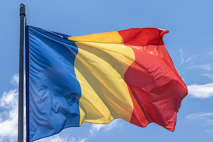 Romanian Flag Against Blue Sky