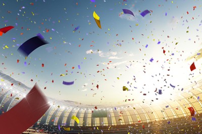Stadium Confetti Against Bright Sky