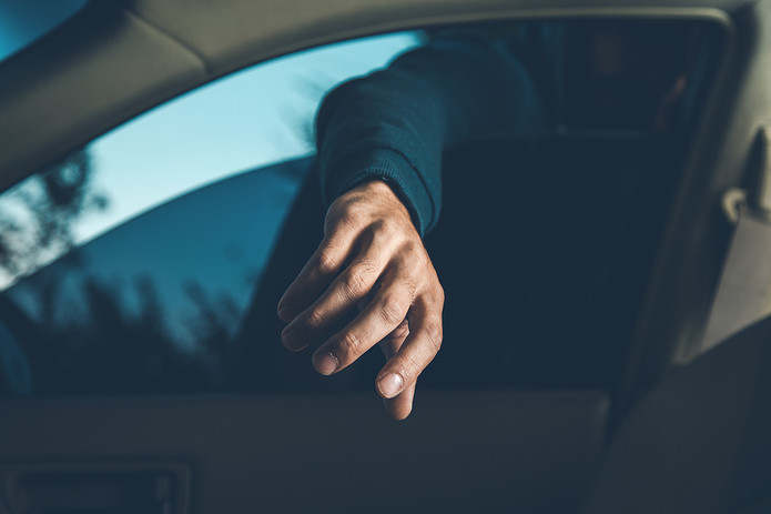 Thief Reaching Into Car