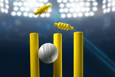 Bola Kriket Putih Memukul Gawang Kuning Di Bawah Lampu Sorot