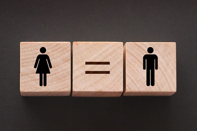 Wooden Cubes Illustrating Gender Equality